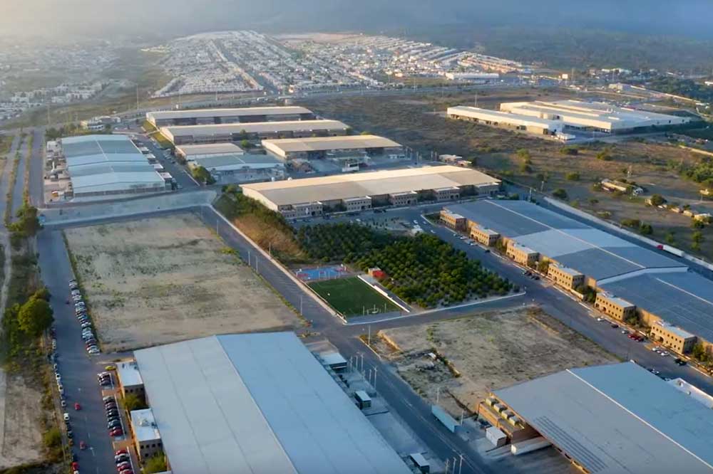 Skilled manufacturing workforce in Saltillo, Mexico, working in a modern production facility.